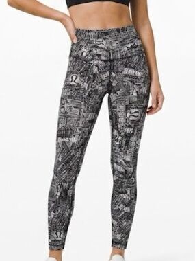 Lululemon wunder trainer hr 25" tear it up alpine white and black rare leggings